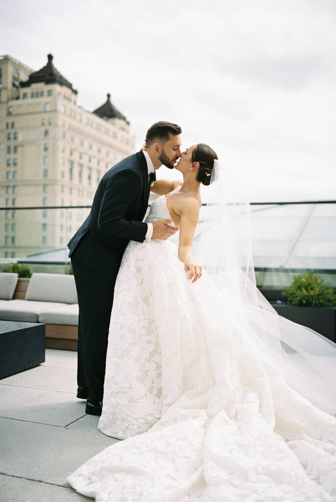 Bride and groom on the rooftop at Book Tower Detroit