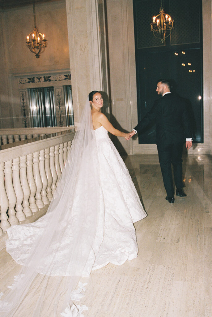 Bride and groom photographed with direct flash on film at Book Tower Detroit